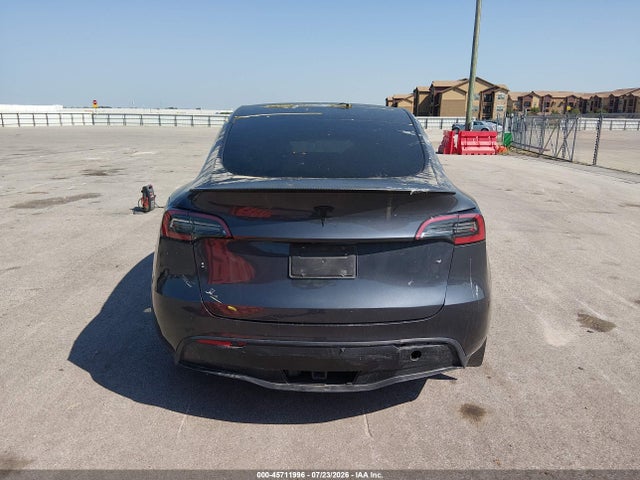 Продажа на аукционе авто 2023 Tesla Model Y Awd/long Range Dual Motor All-wheel Drive, vin: 7SAYGAEE5PF584659, номер лота: 45711996