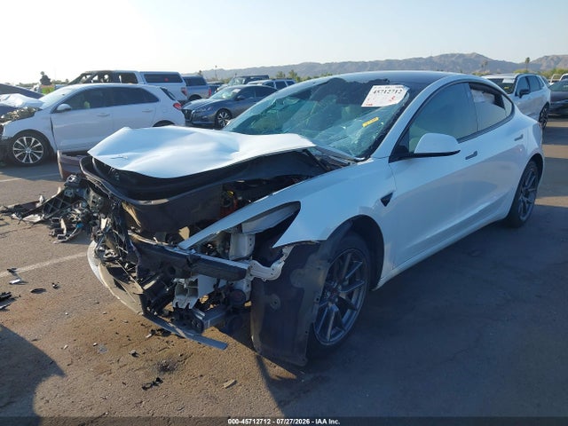 Tesla Model 3 Standard Range Plus Rear-wheel Drive 2021 5YJ3E1EA3MF994320 Image 2