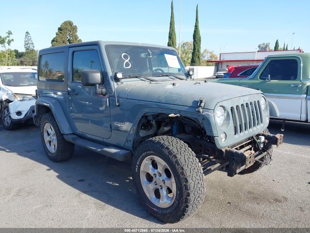 Jeep Wrangler Sahara 2014 1C4AJWBG2EL228280 main image