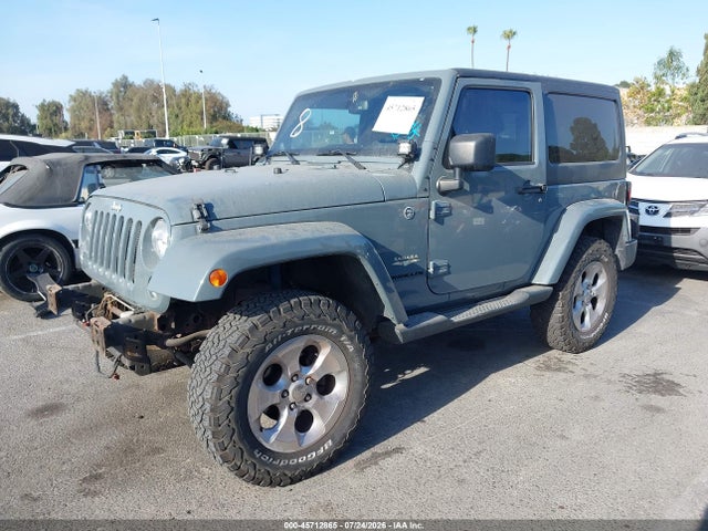 1C4AJWBG2EL228280 Jeep Wrangler Sahara