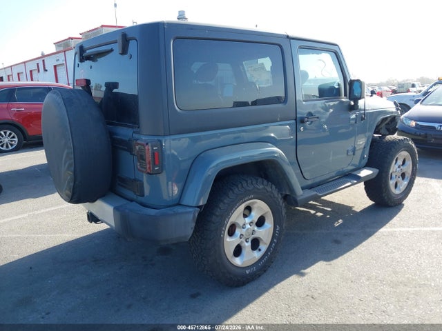 1C4AJWBG2EL228280 Jeep Wrangler Sahara