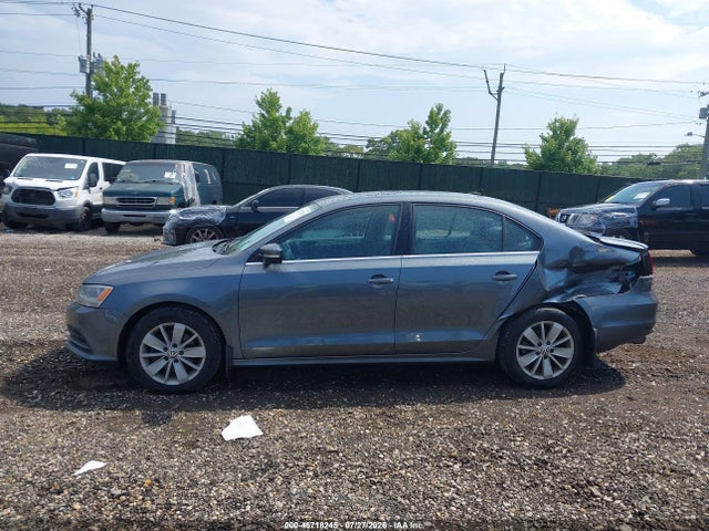 2015 Volkswagen Jetta 1.8t Se მანქანა იყიდება აუქციონზე, vin: 3VWD17AJ0FM310294, აუქციონის ნომერი: 45718245