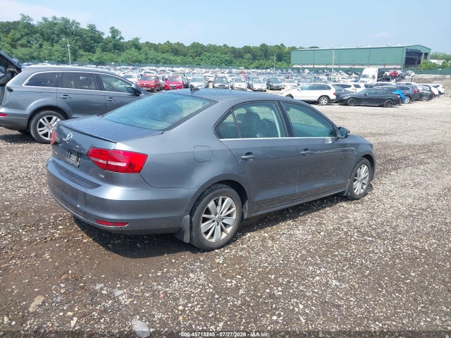 2015 Volkswagen Jetta 1.8t Se მანქანა იყიდება აუქციონზე, vin: 3VWD17AJ0FM310294, აუქციონის ნომერი: 45718245