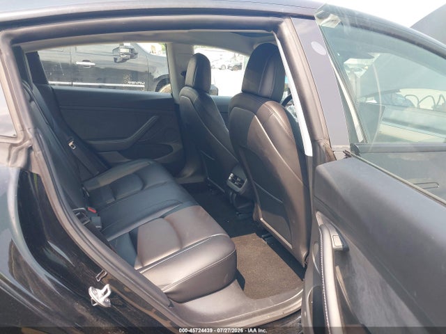 2021 Tesla Model 3 Standard Range Plus Rear-wheel Drive მანქანა იყიდება აუქციონზე, vin: 5YJ3E1EA1MF027415, აუქციონის ნომერი: 45724439