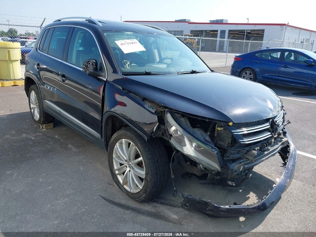 45729409 :رقم المزاد ، WVGBV3AX3EW542488 vin ، 2014 Volkswagen Tiguan Sel مزاد بيع