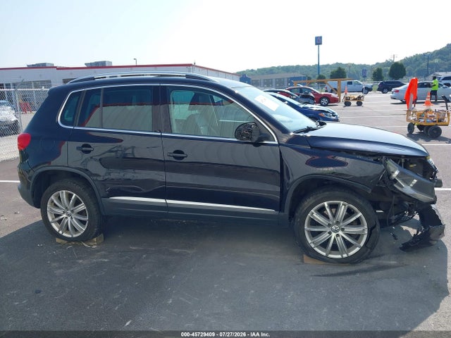 2014 Volkswagen Tiguan Sel მანქანა იყიდება აუქციონზე, vin: WVGBV3AX3EW542488, აუქციონის ნომერი: 45729409
