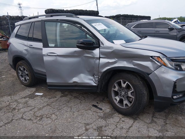 5FNYF8H65PB035248 Honda Passport Awd Trailsport