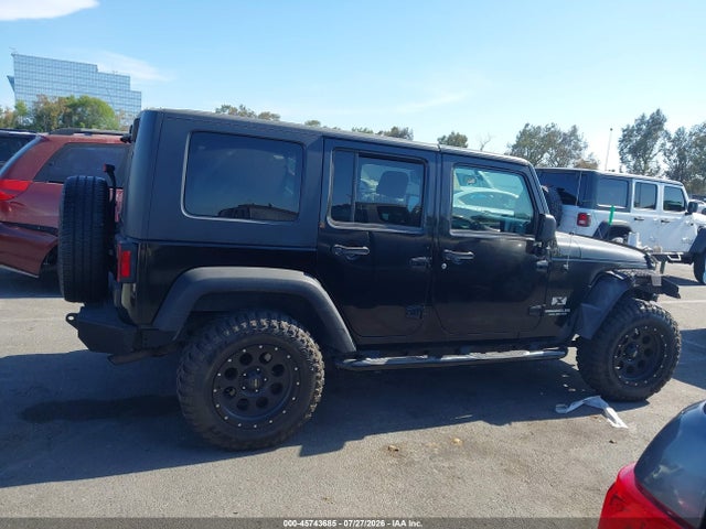 2007 Jeep Wrangler Unlimited X მანქანა იყიდება აუქციონზე, vin: 1J4GA39177L169993, აუქციონის ნომერი: 45743685