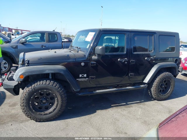 2007 Jeep Wrangler Unlimited X მანქანა იყიდება აუქციონზე, vin: 1J4GA39177L169993, აუქციონის ნომერი: 45743685
