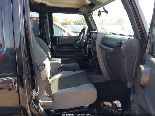 2007 Jeep Wrangler Unlimited X მანქანა იყიდება აუქციონზე, vin: 1J4GA39177L169993, აუქციონის ნომერი: 45743685