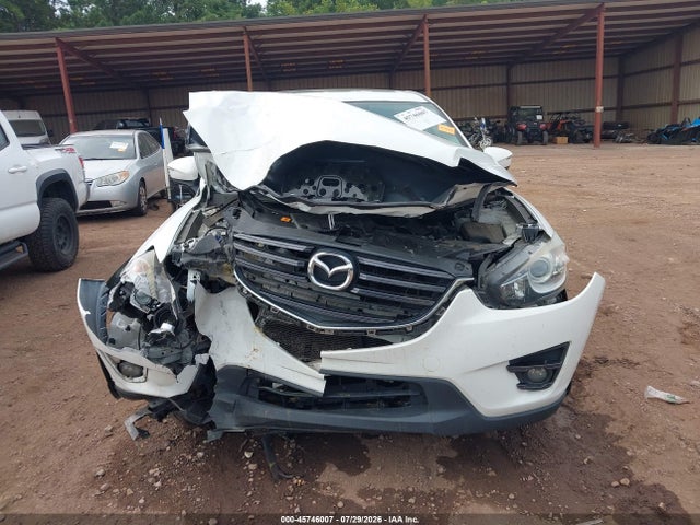 2016 Mazda Cx-5 Touring მანქანა იყიდება აუქციონზე, vin: JM3KE4CY9G0878580, აუქციონის ნომერი: 45746007