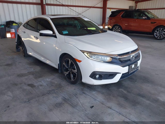 Honda Civic Touring 2017 19XFC1F94HE203182 главное изображение
