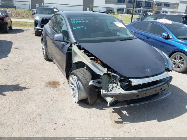 Tesla Model Y Awd/long Range Dual Motor All-wheel Drive 2023 7SAYGAEE6PF674113 main image