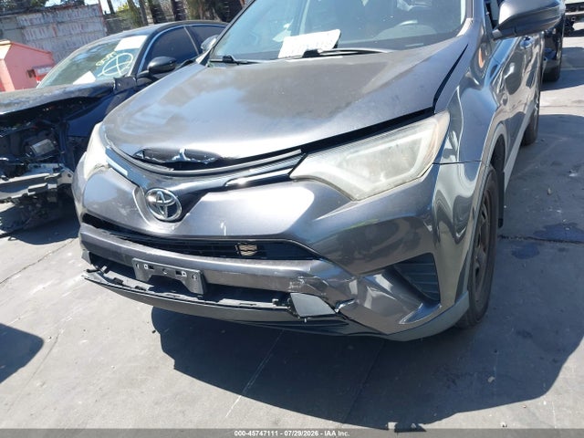 2T3ZFREVXGW306871 Toyota RAV4 LE