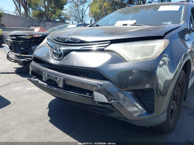 2T3ZFREVXGW306871 Toyota RAV4 LE