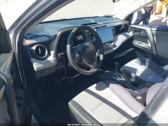 JTMWFREV5EJ009215 Toyota Rav4 Xle