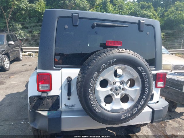 Продажа на аукционе авто 2015 Jeep Wrangler Sahara, vin: 1C4AJWBG7FL682218, номер лота: 45753805