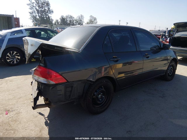 2002 Mitsubishi Lancer Es მანქანა იყიდება აუქციონზე, vin: JA3AJ26E62U007917, აუქციონის ნომერი: 45762600