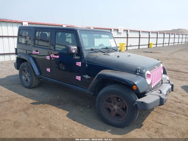 Jeep Wrangler Unlimited Freedom Edition 2015 1C4BJWDG8FL594053 головне зображення