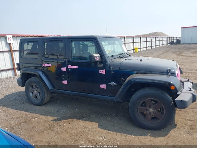 1C4BJWDG8FL594053 Jeep Wrangler Unlimited Freedom Edition