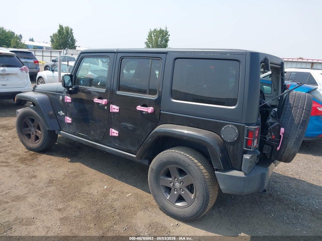 1C4BJWDG8FL594053 Jeep Wrangler Unlimited Freedom Edition
