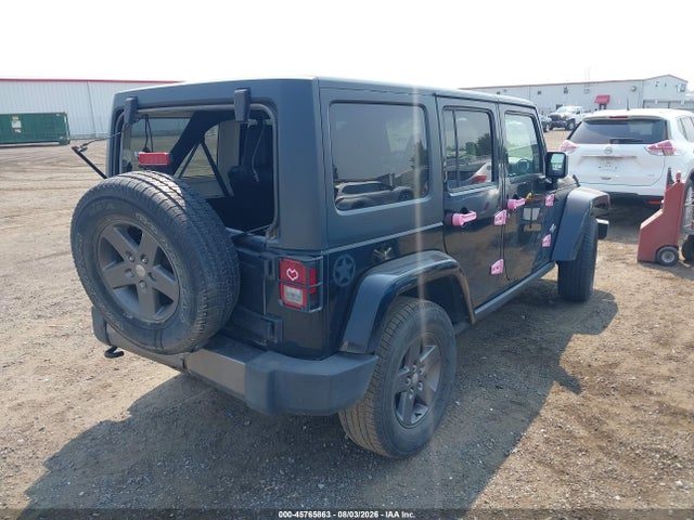 1C4BJWDG8FL594053 Jeep Wrangler Unlimited Freedom Edition