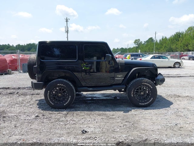 1C4AJWBG8EL194619 Jeep Wrangler Sahara