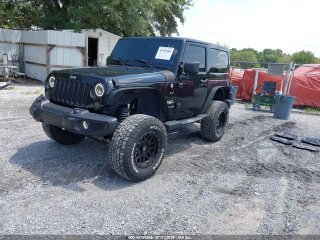 1C4AJWBG8EL194619 Jeep Wrangler Sahara