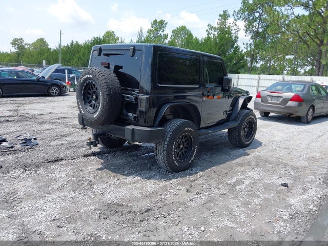 1C4AJWBG8EL194619 Jeep Wrangler Sahara