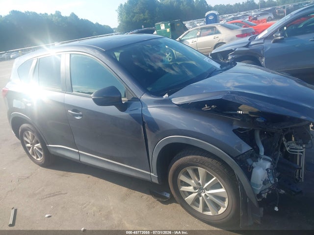 2016 Mazda Cx-5 Touring მანქანა იყიდება აუქციონზე, vin: JM3KE2CYXG0689120, აუქციონის ნომერი: 45772055