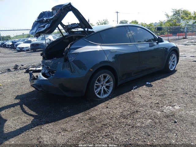 Tesla Model Y Long Range Dual Motor All-wheel Drive 2024 7SAYGDEE3RF036051 Image 4
