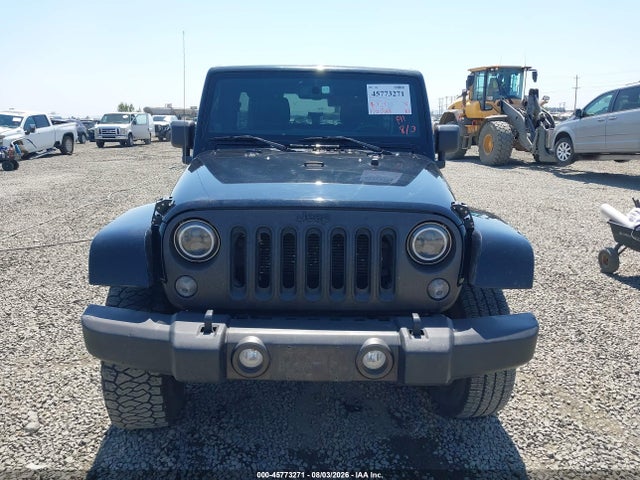 1C4BJWDG5EL184678 Jeep Wrangler Unlimited Freedom Edition