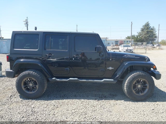 1C4BJWDG5EL184678 Jeep Wrangler Unlimited Freedom Edition
