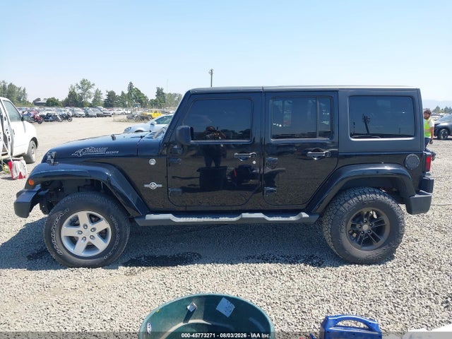 1C4BJWDG5EL184678 Jeep Wrangler Unlimited Freedom Edition