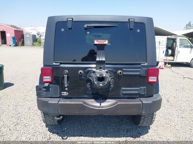 1C4BJWDG5EL184678 Jeep Wrangler Unlimited Freedom Edition