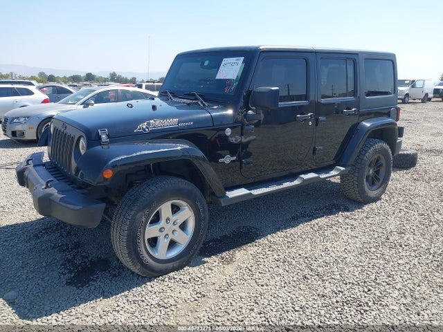 1C4BJWDG5EL184678 Jeep Wrangler Unlimited Freedom Edition