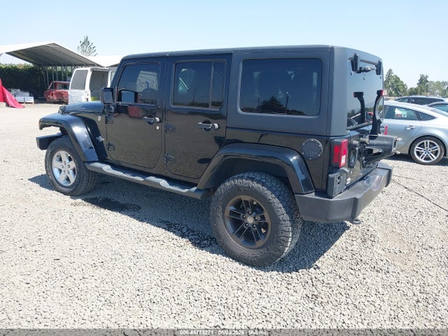 1C4BJWDG5EL184678 Jeep Wrangler Unlimited Freedom Edition