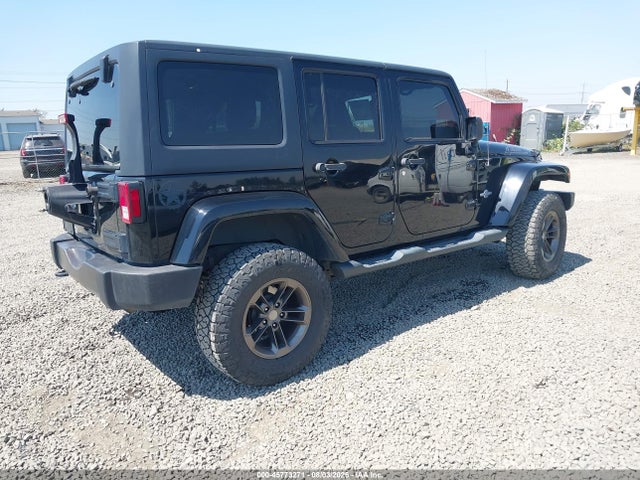 1C4BJWDG5EL184678 Jeep Wrangler Unlimited Freedom Edition