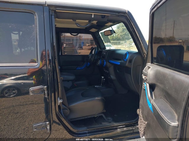 1C4BJWDG5EL184678 Jeep Wrangler Unlimited Freedom Edition