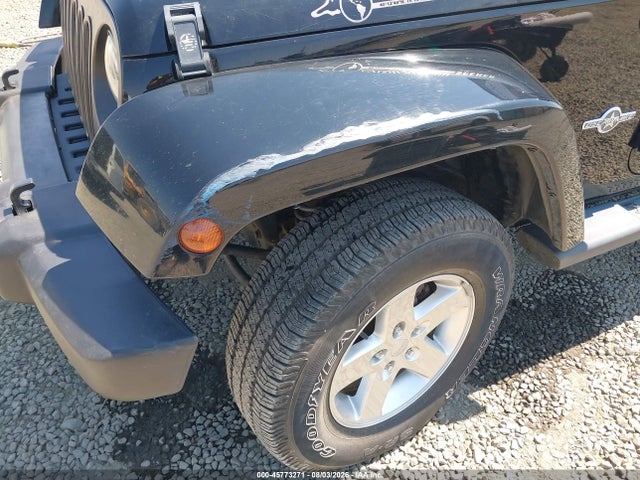 1C4BJWDG5EL184678 Jeep Wrangler Unlimited Freedom Edition