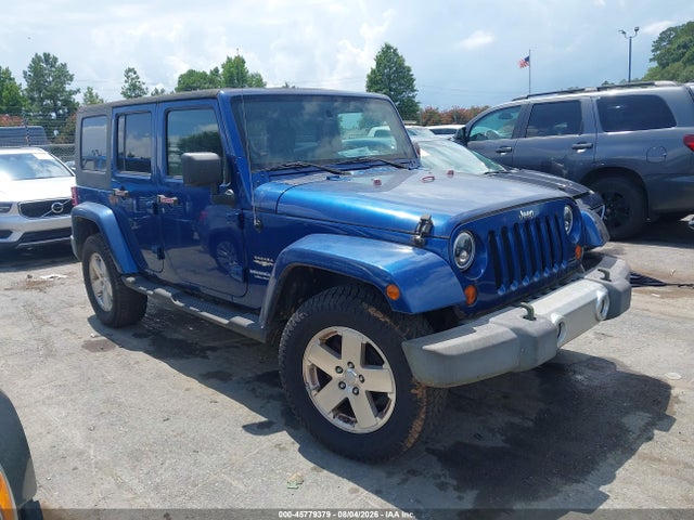 2009 Jeep Wrangler Unlimited Sahara მანქანა იყიდება აუქციონზე, vin: 1J4GA59139L765388, აუქციონის ნომერი: 45779379