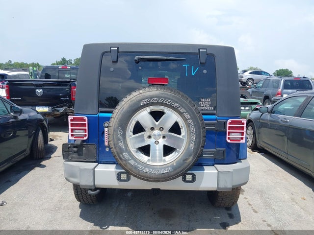 2009 Jeep Wrangler Unlimited Sahara მანქანა იყიდება აუქციონზე, vin: 1J4GA59139L765388, აუქციონის ნომერი: 45779379