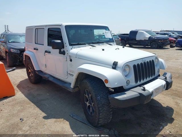 2015 Jeep Wrangler Unlimited Sahara მანქანა იყიდება აუქციონზე, vin: 1C4BJWEG2FL613064, აუქციონის ნომერი: 45789773
