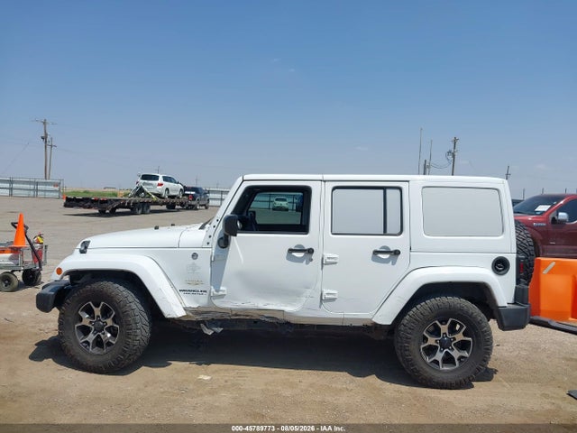 2015 Jeep Wrangler Unlimited Sahara მანქანა იყიდება აუქციონზე, vin: 1C4BJWEG2FL613064, აუქციონის ნომერი: 45789773