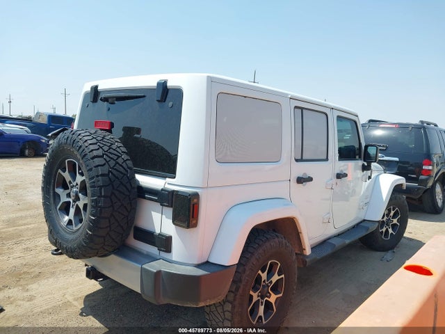 2015 Jeep Wrangler Unlimited Sahara მანქანა იყიდება აუქციონზე, vin: 1C4BJWEG2FL613064, აუქციონის ნომერი: 45789773