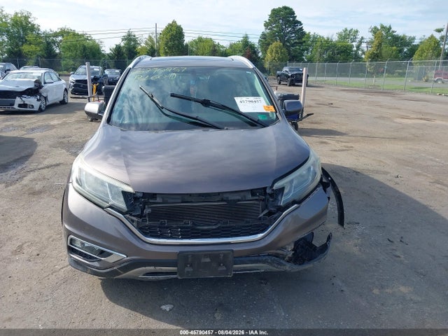 Продажа на аукционе авто 2015 Honda Cr-v Ex-l, vin: 2HKRM4H7XFH693904, номер лота: 45790457