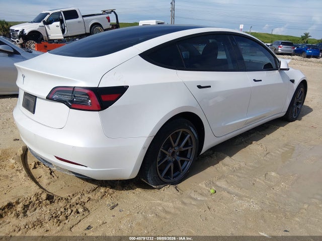Tesla Model 3 Standard Range Plus Rear-wheel Drive 2021 5YJ3E1EA4MF099001 Image 4