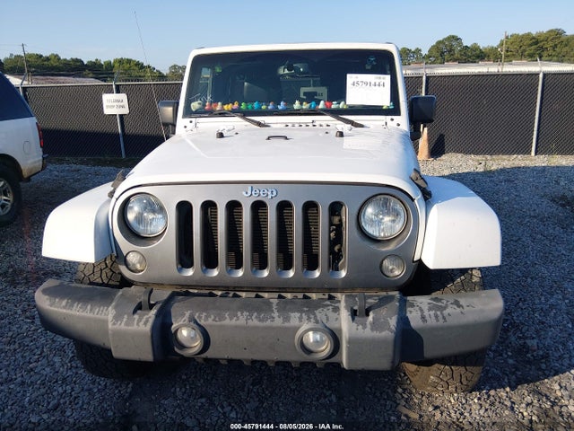 2015 Jeep Wrangler Unlimited Freedom Edition მანქანა იყიდება აუქციონზე, vin: 1C4HJWDG1FL560935, აუქციონის ნომერი: 45791444