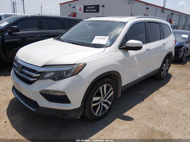Продаж на аукціоні авто 2017 Honda Pilot Touring, vin: 5FNYF5H95HB018556, номер лоту: 45796081