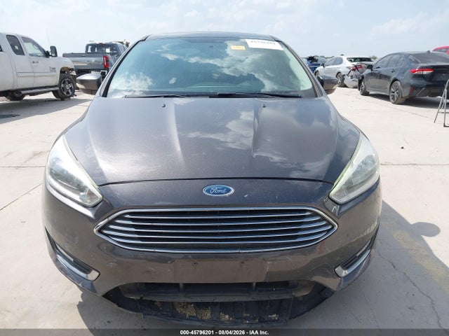 Продаж на аукціоні авто 2015 Ford Focus Titanium, vin: 1FADP3J28FL334031, номер лоту: 45796201
